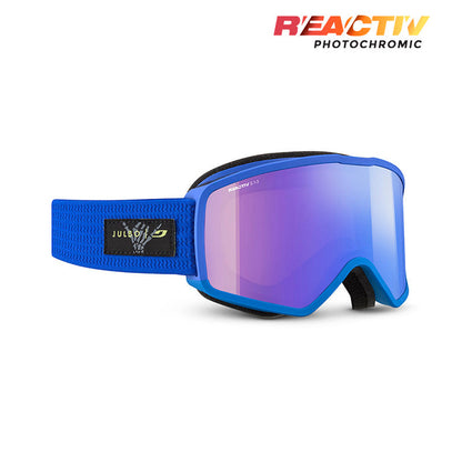 Blue ski goggles with a purple reflective photochromic lens and a blue adjustable strap, shown on a white background with the 'REACTIV PHOTOCHROMIC' logo in the top right. #color_blue-blue-with-reactiv-1-3-high-contrast-lens