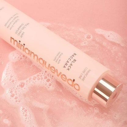 Lifestyle image of Miriam Quevedo Black Baccara Hair Multiplying Shampoo