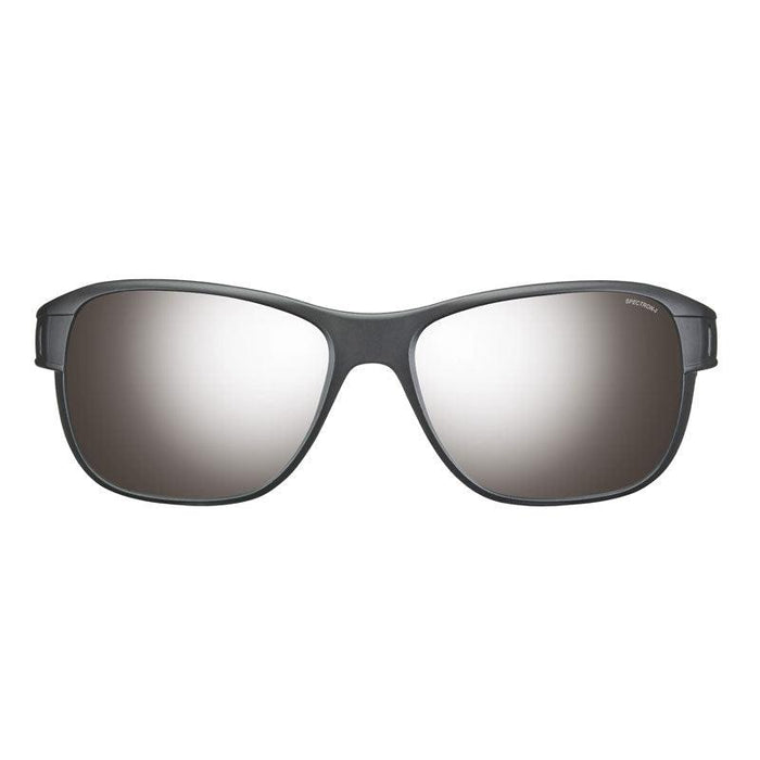 Front view of Julbo USA Camino Lenses & Parts sunglasses with black frames, large mirrored lenses reflecting light, and sleek temple arms. #color_camino-spectron-4-lens-brown-silver-flash