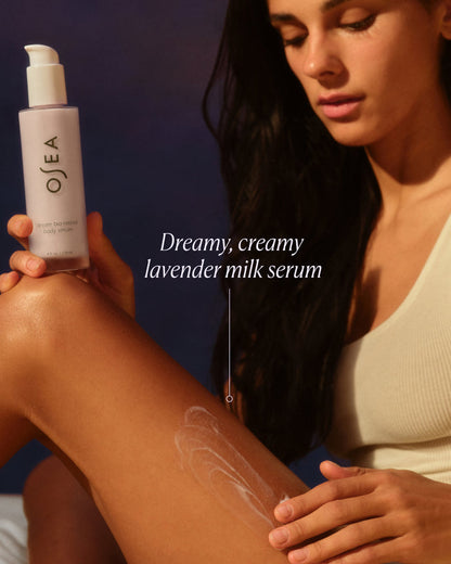 Dreamy, creamy lavender milk serum applied to skin to demonstrate silky texture