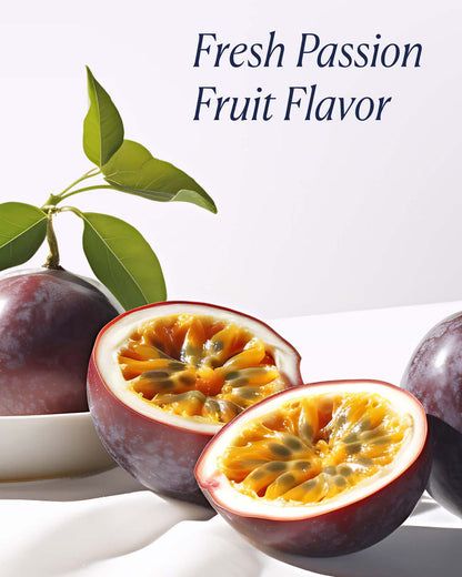 Passion fruit with a cut open to reveal its interior on a white background.