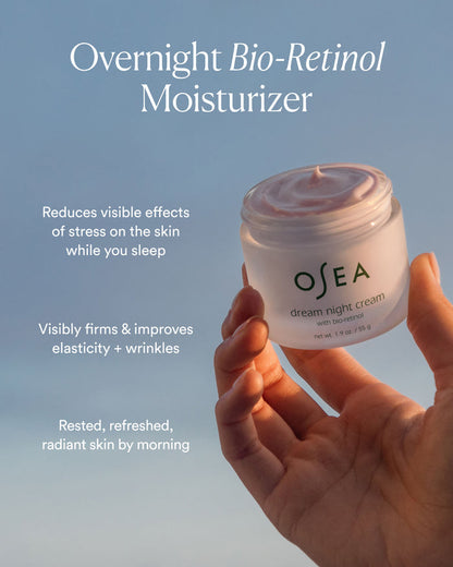 Dream Night Cream held against a soft blue backdrop highlighting overnight firming and visible wrinkle-smoothing benefits