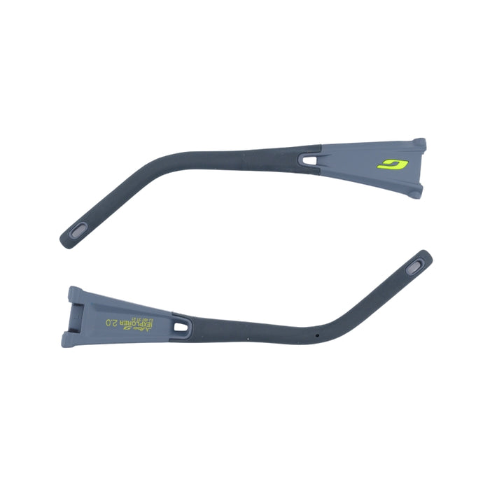 Two gray and black curved plastic parts with green accents—likely temple arms for Julbo USA Explorer 2.0 sunglasses—feature end loops and printed text, shown side by side on a white background.