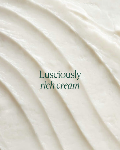 Close-up of luscious cream with text 'Lusciously rich cream' on a white background
