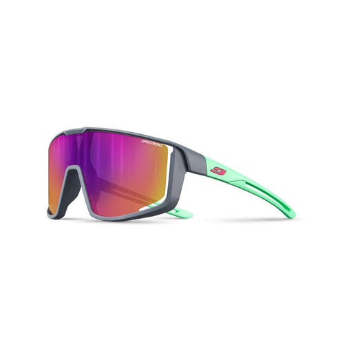 The Julbo-usa Fury S Kids sunglasses feature a sporty gray frame, green arms, and large mirrored purple-orange Spectron lenses—perfect for active youth. #color_grey-mint-with-spectron-3-lens