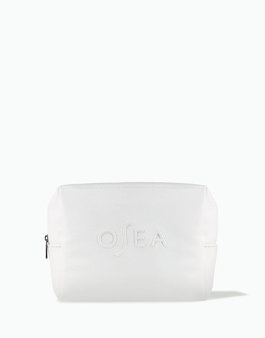 OSEA white zippered cosmetic bag with embossed logo on white background for ecommerce display