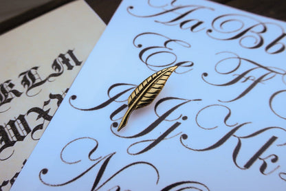 Quill Gold Lapel Pin