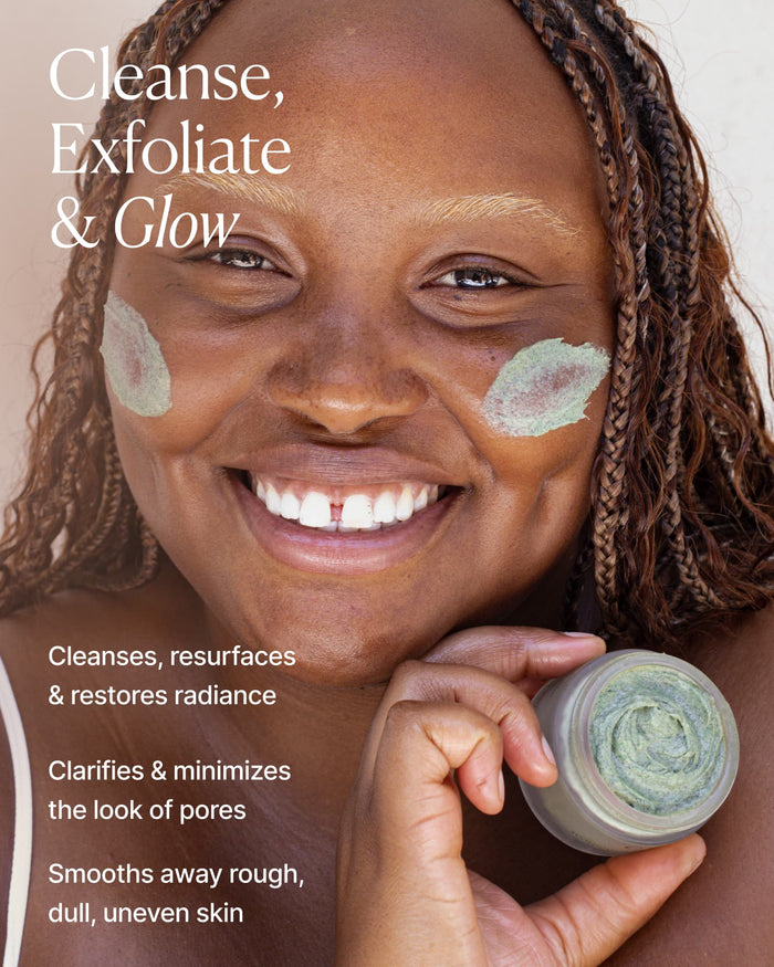 Model applying Seaglow Resurfacing Scrub with “Cleanse, Exfoliate & Glow” messaging highlighting radiance and pore refinement