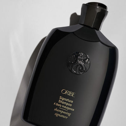 Image of an open Oribe Signature Shampoo variant: 8.5 fl oz