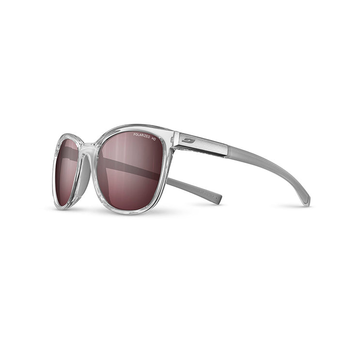 The Julbo-usa Spark women's sunglasses feature clear frames, round brown polarized lenses, and gray temples in a high-performance design, displayed at a three-quarter angle on a white background. #color_translucent-crystal-gray-with-spectron-3-polarized-hd-lens