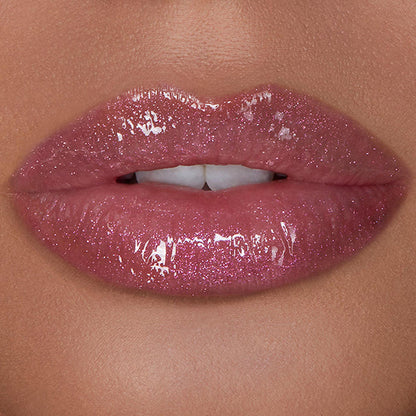 Model image of Hourglass Unreal High Shine Volumizing Lip Gloss variant: Cosmic