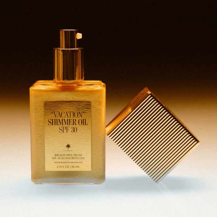 Image of an open Vacation "Vacation” Shimmer Oil SPF 30