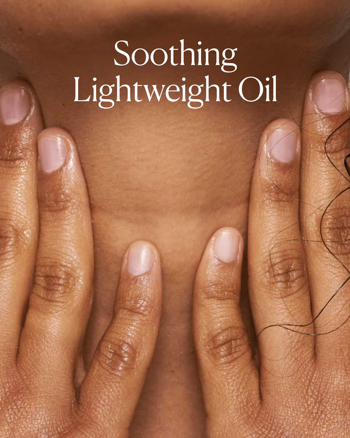 Close-up of hands with 'Soothing Lightweight Oil' text on a brown background