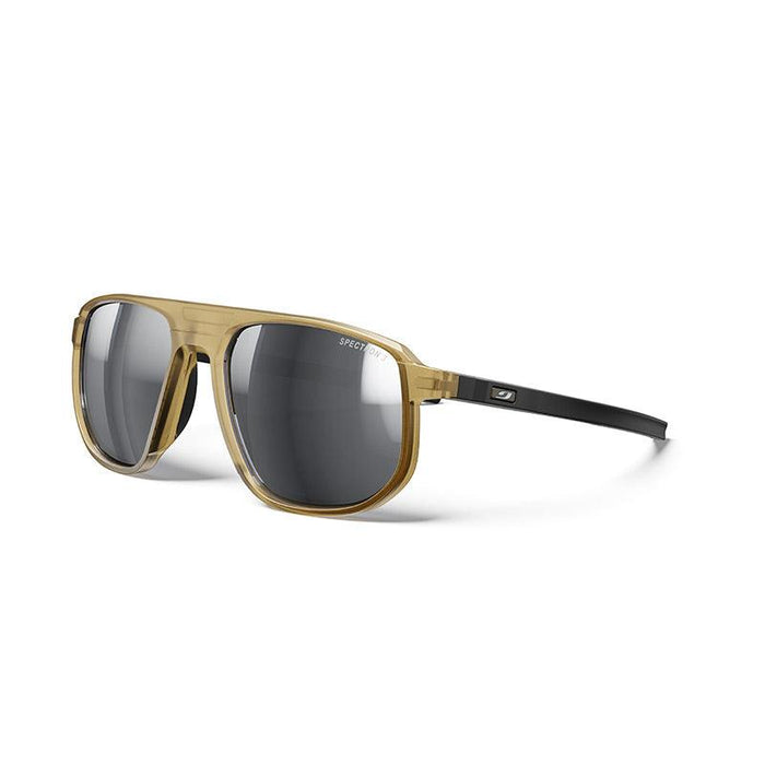 The Julbo Eyewear Ward sunglasses feature light brown translucent frames, black arms, and dark tinted lenses—perfect for après ski adventures. Displayed on a white background #color_light-brown-black-with-spectron-3-lens