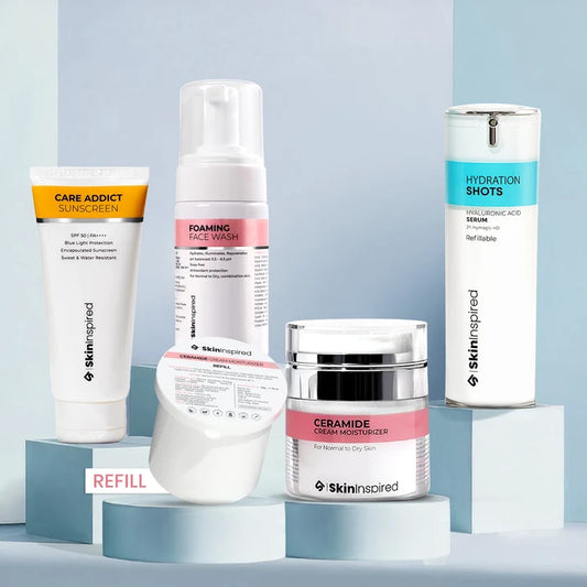 Collection of skincare products from Skininspired on a light blue background
